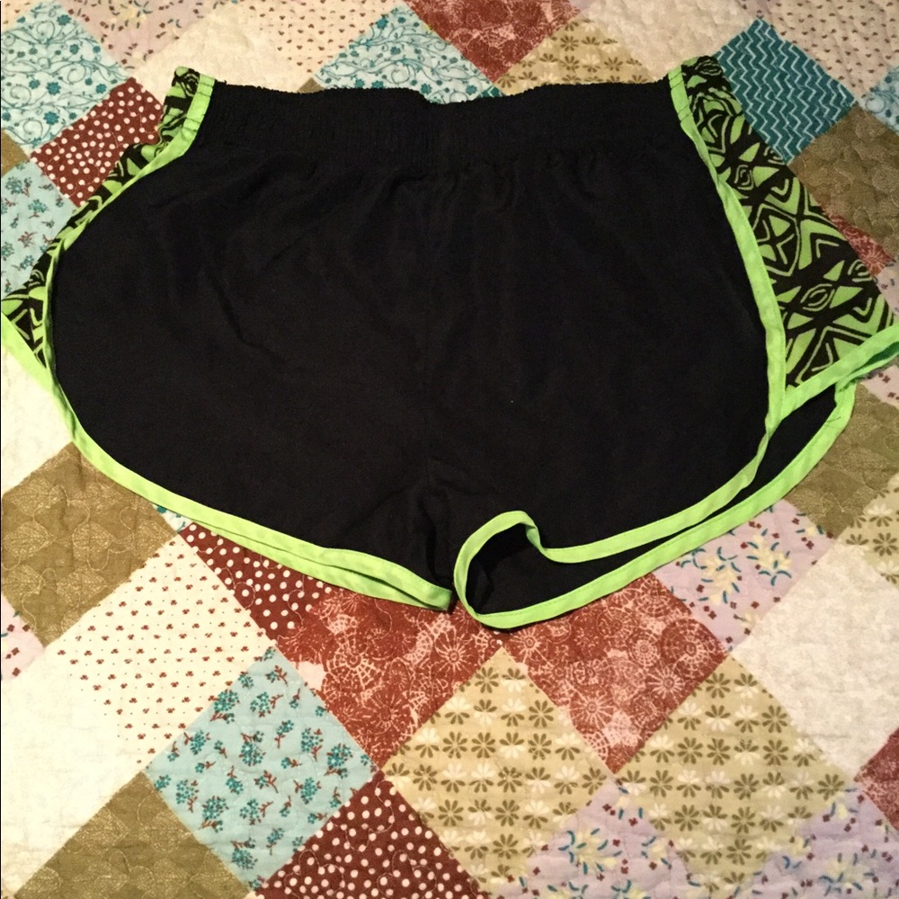 Black and green running shorts
